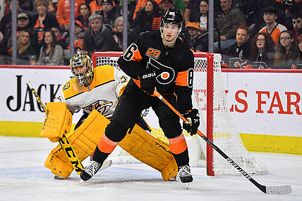 Mar 17, 2022; Philadelphia, Pennsylvania, USA; Philadelphia Flyers left wing Joel Farabee (86) screens Nashville Predators goaltender Juuse Saros (74) during the second period at Wells Fargo Center. Mandatory Credit: Eric Hartline-USA TODAY Sports