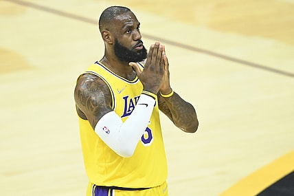Mar 21, 2022; Cleveland, Ohio, USA; Los Angeles Lakers forward LeBron James (6) reacts to cheers in the first quarter against the Cleveland Cavaliers at Rocket Mortgage FieldHouse. Mandatory Credit: David Richard-USA TODAY Sports