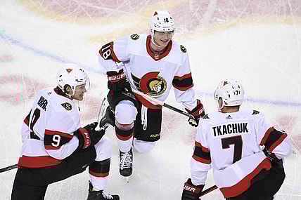 Mar 4, 2021; Calgary, Alberta, CAN; Ottawa Senators forward Josh Norris (9) forward Tim Stuetzle (18) and forward Brady Tkachuk (7) warm up against the Calgary Flames at Scotiabank Saddledome. Mandatory Credit: Candice Ward-USA TODAY Sports