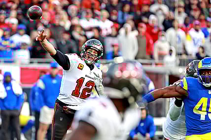 Jan 23, 2022; Tampa, Florida, USA; Tampa Bay Buccaneers quarterback Tom Brady (12) throws a the ball during the second half against the Los Angeles Rams in a NFC Divisional playoff football game at Raymond James Stadium. Mandatory Credit: Matt Pendleton-USA TODAY Sports
