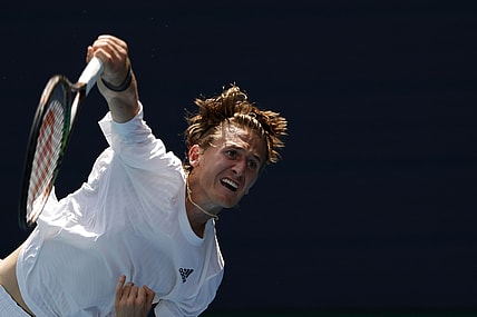 Mar 24, 2022; Miami Gardens, FL, USA; Sebastian Korda (USA) serves against Alejandro Davidovich Fokina (ESP) (not pictured) in a first round men's singles match in the Miami Open at Hard Rock Stadium. Mandatory Credit: Geoff Burke-USA TODAY Sports