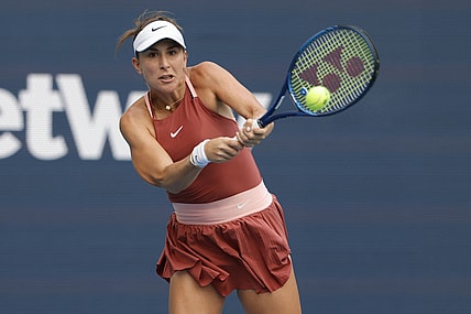 Mar 31, 2022; Miami Gardens, FL, USA; Belinda Bencic (SUI) hits a backhand against Naomi Osaka (JPN)(not pictured) in a women's singles semifinal in the Miami Open at Hard Rock Stadium. Mandatory Credit: Geoff Burke-USA TODAY Sports