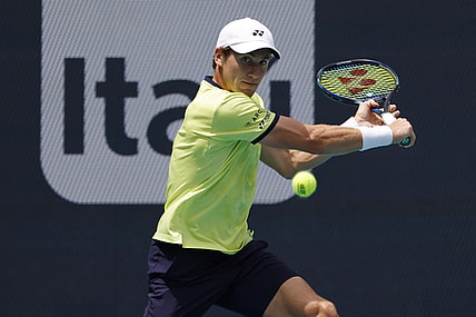 Apr 3, 2022; Miami Gardens, FL, USA; Casper Ruud (NOR) hits a backhand against Carlos Alcaraz (ESP)(not pictured) in the men's singles final in the Miami Open at Hard Rock Stadium. Mandatory Credit: Geoff Burke-USA TODAY Sports