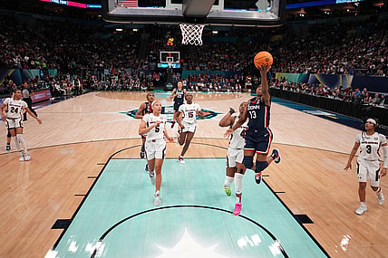 Apr 3, 2022; Minneapolis, MN, USA; UConn Huskies guard Christyn Williams (13) shoots the ball against the South Carolina Gamecocks  in the Final Four championship game of the women's college basketball NCAA Tournament at Target Center. Mandatory Credit: Kirby Lee-USA TODAY Sports