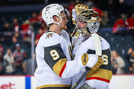 Apr 14, 2022; Calgary, Alberta, CAN; Vegas Golden Knights center Jack Eichel (9) and goaltender Logan Thompson (36) celebrate win against the Calgary Flames at Scotiabank Saddledome. Mandatory Credit: Sergei Belski-USA TODAY Sports