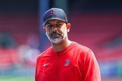 Apr 15, 2022; Boston, Massachusetts, USA; Boston Red Sox manager Alex Cora (13) reacts before playing the Minnesota Twins at Fenway Park. Mandatory Credit: Paul Rutherford-USA TODAY Sports