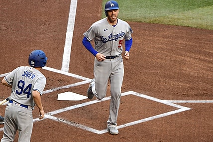 Apr 25, 2022; Phoenix, Arizona, USA; Los Angeles Dodgers first baseman Freddie Freeman (5) scores in the first inning against the Arizona Diamondbacks at Chase Field. Mandatory Credit: Matt Kartozian-USA TODAY Sports