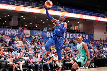 Arike Ogunbowale of the Dallas Wings drives to the basket.