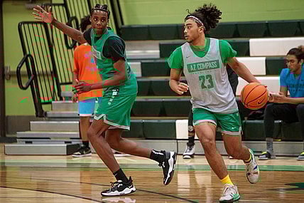 December 6, 2021; Chandler, AZ; AZ Compass Prep varsity basketball player, junior, Kylan Boswell, 23, and junior, Mookie Cook, 1, practice at the AZ Compass Prep gymnasium the week of the Hoophall West tournament

Az Compass Basketball
