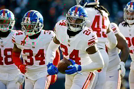 Jan 2, 2022; Chicago, Illinois, USA; New York Giants cornerback James Bradberry (24) reacts after intercepting a pass against the Chicago Bears during the second half at Soldier Field. Mandatory Credit: Jon Durr-USA TODAY Sports