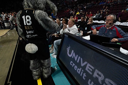 March 8, 2022; Las Vegas, NV, USA; Las Vegas Aces mascot Buckets and owner Mark Davis during the first half in the finals of the WCC Basketball Championships at Orleans Arena. Mandatory Credit: Kyle Terada-USA TODAY Sports