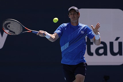 Mar 26, 2022; Miami Gardens, FL, USA; Andy Murray (GBR) hits a forehand against Daniil Medvedev (not pictured) in a second round men's singles match in the Miami Open at Hard Rock Stadium. Mandatory Credit: Geoff Burke-USA TODAY Sports