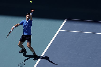 Mar 26, 2022; Miami Gardens, FL, USA; Andy Murray (GBR) serves against Daniil Medvedev (not pictured) in a second round men's singles match in the Miami Open at Hard Rock Stadium. Mandatory Credit: Geoff Burke-USA TODAY Sports