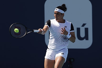 Mar 28, 2022; Miami Gardens, FL, USA; Ons Jabeur (TUN) hits a forehand against Danielle Collins (USA)(not pictured) in a fourth round women's singles match in the Miami Open at Hard Rock Stadium. Mandatory Credit: Geoff Burke-USA TODAY Sports