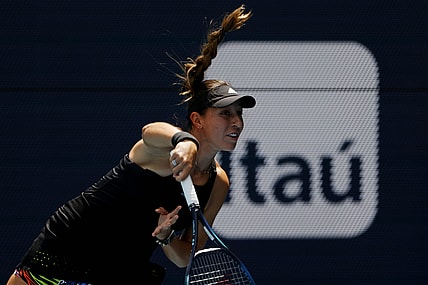 Mar 30, 2022; Miami Gardens, FL, USA; Jessica Pegula (USA) serves against Paula Badosa (ESP)(not pictured) in a women's singles quarterfinal match in the Miami Open at Hard Rock Stadium. Mandatory Credit: Geoff Burke-USA TODAY Sports