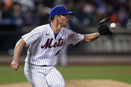 Apr 20, 2022; New York City, New York, USA; New York Mets starting pitcher Chris Bassitt (40) catches the ball for an out at first base during the fourth inning against the San Francisco Giants at Citi Field. Mandatory Credit: Vincent Carchietta-USA TODAY Sports