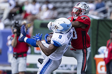 Apr 24, 2022; Birmingham, AL, USA; New Orleans Breakers wide receiver Jonathan Adams (9) catches the ball with Tampa Bay Bandits defensive back Quenton Meeks (30) on tight defense during the first half at Protective Stadium. Mandatory Credit: Vasha Hunt-USA TODAY Sports