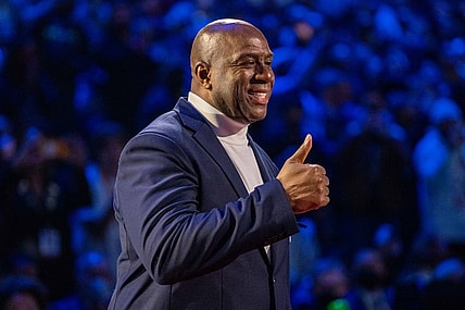 February 20, 2022; Cleveland, Ohio, USA; NBA great Magic Johnson is honored for being selected to the NBA 75th Anniversary Team during halftime in the 2022 NBA All-Star Game at Rocket Mortgage FieldHouse. Mandatory Credit: Kyle Terada-USA TODAY Sports