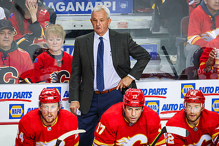 May 3, 2022; Calgary, Alberta, CAN; Calgary Flames head coach Darryl Sutter on his bench against the Dallas Stars during the second period in game one of the first round of the 2022 Stanley Cup Playoffs at Scotiabank Saddledome. Mandatory Credit: Sergei Belski-USA TODAY Sports