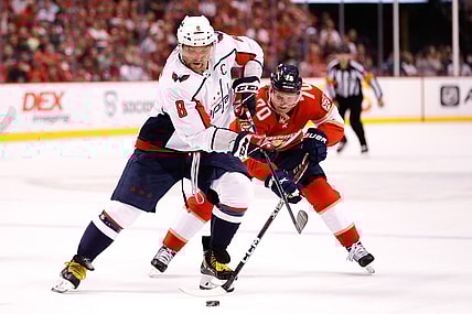 May 3, 2022; Sunrise, Florida, USA; Washington Capitals left wing Alex Ovechkin (8) moves the puck ahead of Florida Panthers right wing Patric Hornqvist (70) during the first period in game one of the first round of the 2022 Stanley Cup Playoffs at FLA Live Arena. Mandatory Credit: Sam Navarro-USA TODAY Sports