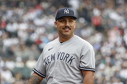 May 15, 2022; Chicago, Illinois, USA; New York Yankees starting pitcher Nestor Cortes (65) smiles as he returns to dugout after pitching against the Chicago White Sox during the eight inning at Guaranteed Rate Field. Mandatory Credit: Kamil Krzaczynski-USA TODAY Sports