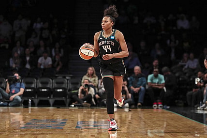 May 17, 2022; Brooklyn, New York, USA;  New York Liberty forward Betnijah Laney (44) brings the ball up court in the second quarter against the Connecticut Sun at Barclays Center. Mandatory Credit: Wendell Cruz-USA TODAY Sports