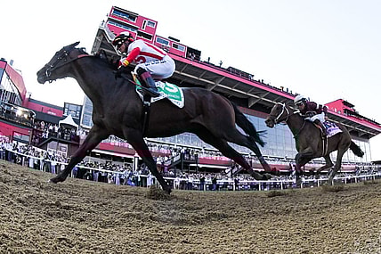 May 21, 2022; Baltimore, MD, USA;  Jose L Ortiz aboard Early Voting  wins the running of the 147 Preakness Stakes at Pimlico Race Course. Mandatory Credit: Tommy Gilligan-USA TODAY Sports