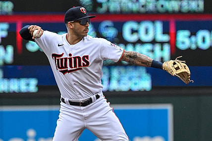 May 28, 2022; Minneapolis, Minnesota, USA;  Minnesota Twins shortstop Carlos Correa (4) throws to first base for a force out against the Kansas City Royals during the first inning at Target Field. Mandatory Credit: Nick Wosika-USA TODAY Sports