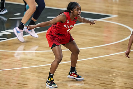 May 27, 2021; College Park, Georgia, USA; Atlanta Dream guard Aari McDonald (4) defends against the Dallas Wings during the second half at Gateway Center Arena at College Park. Mandatory Credit: Dale Zanine-USA TODAY Sports