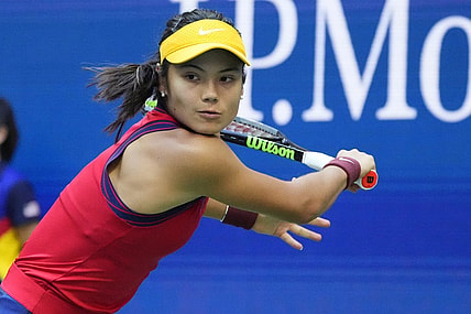 Sep 11, 2021; Flushing, NY, USA; Emma Raducanu of Great Britain hits a backhand against Leylah Fernandez of Canada (not pictured) in the women's singles final on day thirteen of the 2021 U.S. Open tennis tournament at USTA Billie Jean King National Tennis Center. Mandatory Credit: Robert Deutsch-USA TODAY Sports