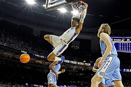 Apr 2, 2022; New Orleans, LA, USA; Duke Blue Devils forward Paolo Banchero (5) dunks the ball against North Carolina Tar Heels forward Brady Manek (45) during the second half in the 2022 NCAA men's basketball tournament Final Four semifinals at Caesars Superdome. Mandatory Credit: Robert Deutsch-USA TODAY Sports