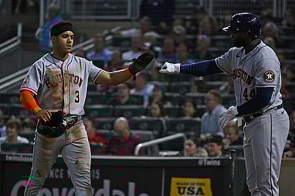 May 10, 2022; Minneapolis, Minnesota, USA;  Houston Astros shortstop Jeremy Pena (3) is congratulated for scoring a run by designated hitter Yordan Alvarez (44) against the Minnesota Twins during the sixth inning at Target Field. Mandatory Credit: Nick Wosika-USA TODAY Sports