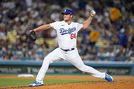 May 16, 2022; Los Angeles, California, USA; Los Angeles Dodgers relief pitcher Caleb Ferguson (64) delivers a pitch in the seventh inning against the Arizona Diamondbacks at Dodger Stadium. Mandatory Credit: Kirby Lee-USA TODAY Sports