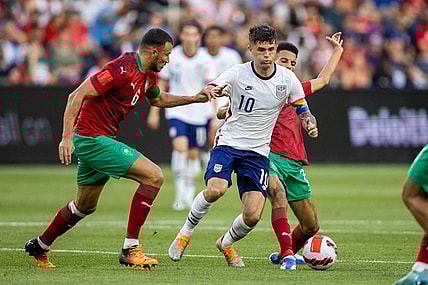 Jun 1, 2022; Cincinnati, Ohio, USA; United States forward Christian Pulisic (10) dribbles the ball while Morocco midfielder Imran Louza (7) defends during an International friendly soccer match at TQL Stadium. Mandatory Credit: Trevor Ruszkowski-USA TODAY Sports