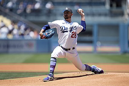 Jun 19, 2022; Los Angeles, California, USA;  Los Angeles Dodgers starting pitcher Andrew Heaney (28) delivers a pitch in the first inning against the Cleveland Guardians at Dodger Stadium. Mandatory Credit: Kirby Lee-USA TODAY Sports