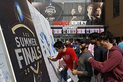 Aug 25, 2019; Detroit, MI, USA; Fans sign the large signing board outside the southwest entrance before the LCS Summer Finals event between Team Liquid and Team Cloud9 at Little Caesars Arena. Mandatory Credit: Raj Mehta-USA TODAY Sports