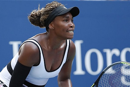 Aug 26, 2019; Flushing, NY, USA; Venus Williams of the United States prepares to return serve against Saisai Zheng of China (not pictured) in the first round on day one of the 2019 U.S. Open tennis tournament at USTA Billie Jean King National Tennis Center. Mandatory Credit: Geoff Burke-USA TODAY Sports