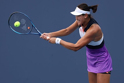 Mar 24, 2021; Miami, Florida, USA; Xiyu Wang of China hits a backhand against Jelena Ostapenko of Latvia (not pictured) in the first round of the Miami Open at Hard Rock Stadium. Mandatory Credit: Geoff Burke-USA TODAY Sports