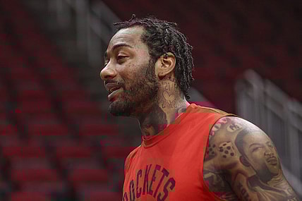Nov 29, 2021; Houston, Texas, USA;  Houston Rockets guard John Wall (1) warms up before playing against the Oklahoma City Thunder at Toyota Center. Mandatory Credit: Thomas Shea-USA TODAY Sports