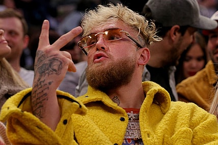 Feb 2, 2022; New York, New York, USA; American boxer Jake Paul gestures at a fan during the third quarter between the New York Knicks and the Memphis Grizzlies at Madison Square Garden. Mandatory Credit: Brad Penner-USA TODAY Sports