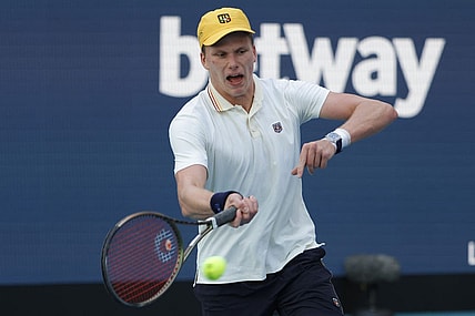 Mar 29, 2022; Miami Gardens, FL, USA; Jenson Brooksby (USA) reacts after winning a point against Daniil Medvedev (not pictured) in a fourth round men's singles match in the Miami Open at Hard Rock Stadium. Mandatory Credit: Geoff Burke-USA TODAY Sports