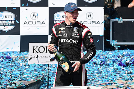 Apr 10, 2022; Long Beach, California, USA; Team Penske driver Josef Newgarden (2) of United States celebrates his victory of the Grand Prix of Long Beach at Long Beach Street Circuit. Mandatory Credit: Gary A. Vasquez-USA TODAY Sports