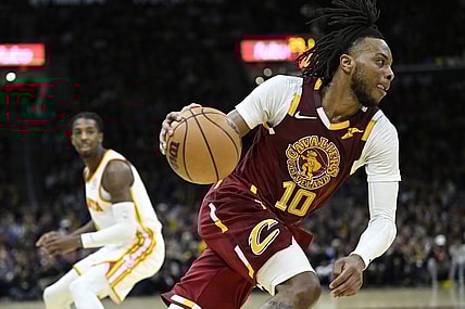 Apr 15, 2022; Cleveland, Ohio, USA; Cleveland Cavaliers guard Darius Garland (10) drives the baseline in the third quarter against the Atlanta Hawks at Rocket Mortgage FieldHouse. Mandatory Credit: David Richard-USA TODAY Sports