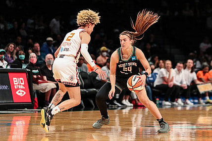May 17, 2022; Brooklyn, New York, USA;  New York Liberty guard Sabrina Ionescu (20) and Connecticut Sun guard Natisha Hiedeman (2) at Barclays Center. Mandatory Credit: Wendell Cruz-USA TODAY Sports