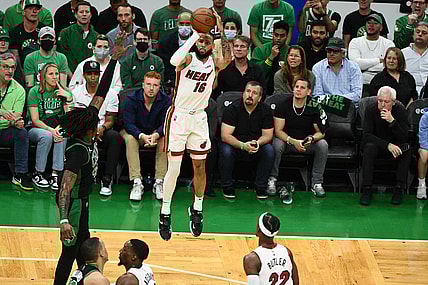 May 27, 2022; Boston, Massachusetts, USA; Miami Heat forward Caleb Martin (16) shoots against the Boston Celtics during the first half in game six of the 2022 eastern conference finals at TD Garden. Mandatory Credit: Brian Fluharty-USA TODAY Sports