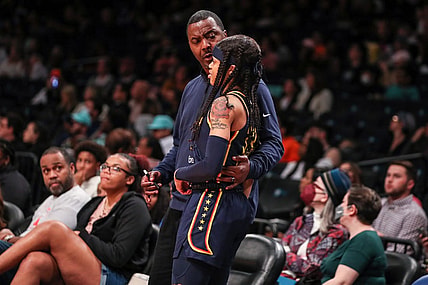 Jun 1, 2022; Brooklyn, New York, USA;  Indiana Fever head coach Carlos Knox and guard Destanni Henderson (33) at Barclays Center. Mandatory Credit: Wendell Cruz-USA TODAY Sports