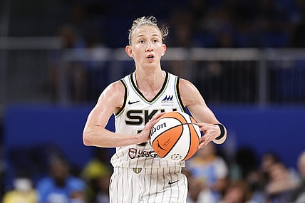 Jun 17, 2022; Chicago, Illinois, USA; Chicago Sky guard Courtney Vandersloot (22) looks to pass the ball against the Atlanta Dream during the second half of a WNBA game at Wintrust Arena. Mandatory Credit: Kamil Krzaczynski-USA TODAY Sports