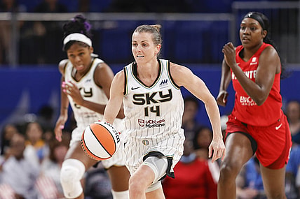Jun 17, 2022; Chicago, Illinois, USA; Chicago Sky guard Allie Quigley (14) brings the ball up court against the Atlanta Dream during the second half of a WNBA game at Wintrust Arena. Mandatory Credit: Kamil Krzaczynski-USA TODAY Sports