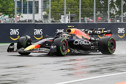 Jun 18, 2022; Montreal, Quebec, CAN; Red Bull Racing driver Sergio Perez of Mexico exits the fourteenth turn during the third free practice session at Circuit Gilles Villeneuve. Mandatory Credit: David Kirouac-USA TODAY Sports