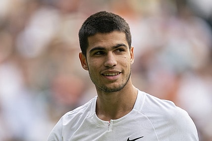 Jul 3, 2022; London, United Kingdom; Carlos Alcaraz (ESP) during his match against Jannik Sinner (ITA) on day seven at All England Lawn Tennis and Croquet Club. Mandatory Credit: Susan Mullane-USA TODAY Sports